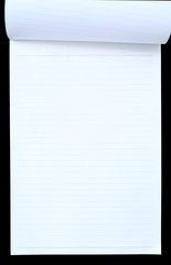Blue Lined Paper tablet isolated on black background
