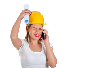 Beautiful female engineer on the phone