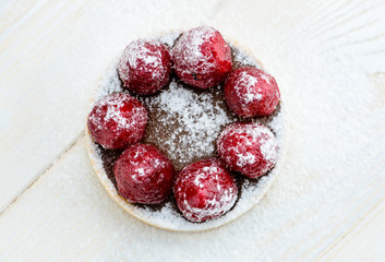 home tartlet with raspberries closeup