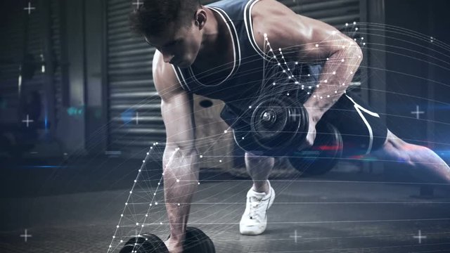 Athlete performing push ups with dumbbell against the animated background