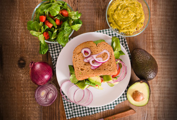 Veggie toast with avocado. 