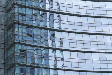 Fototapeta na wymiar Glass facade of a modern office building