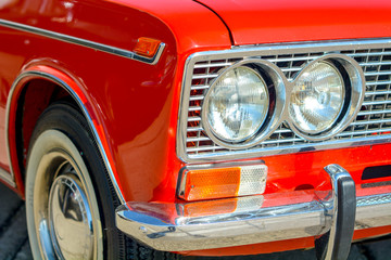 Fototapeta premium Closeup of old retro car headlight