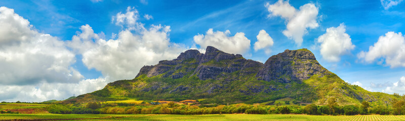 Fototapeta premium View of a lake and mountains. Mauritius. Panorama