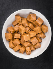 Portion of Caramel pieces on a slate slab