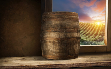 Naklejka premium White wine with barrel on vineyard in Chianti, Tuscany, Italy