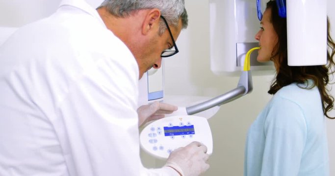 Female patient receiving dental treatment