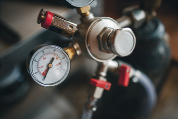 Manometer and faucet closeup