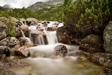 Stone's in Waterfall Skok in Strba tarn - High Tatras in Slovakia.