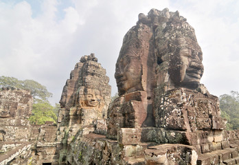 Fototapeta na wymiar The Bayon - richly decorated Khmer temple at Angkor in Cambodia. 