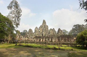 Fototapeta na wymiar The Bayon - richly decorated Khmer temple at Angkor in Cambodia. 