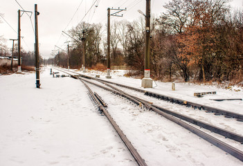 railway receding into the distance in the winter