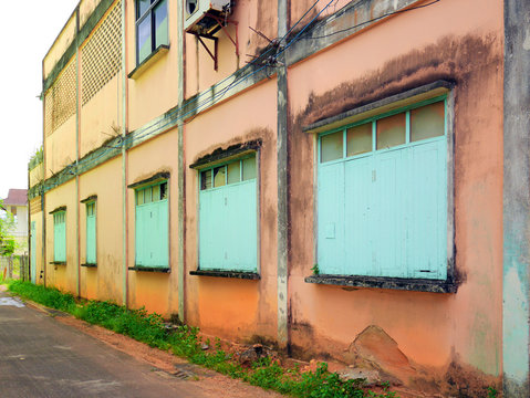Antique building wall and windows in Trang, Thailand