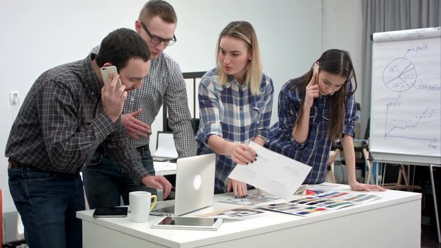 Architects and designers working in the office