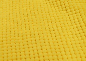 Detail of Yellow Fluffy Fabric Texture Background