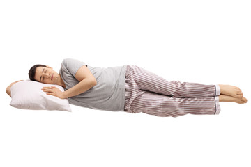 Guy sleeping on a pillow and floating