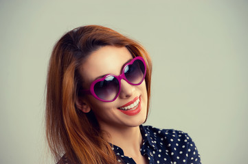 confident, successful, beautiful attractive young woman, fashion girl, posing with sunglasses