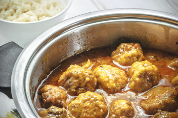 Homemade Meatballs in curry sauce and white rice