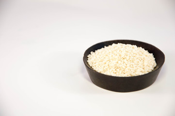 The sesame in wooden bowl. white sesame.