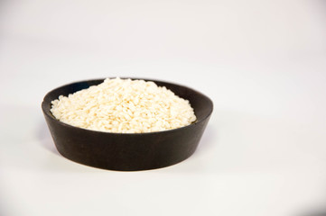 The sesame in wooden bowl. white sesame.