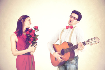 cool guy winning His Woman with a sweet serenade in a valentine's day