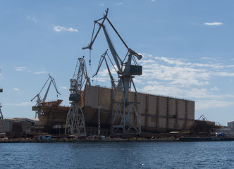 Shipyard building a ship