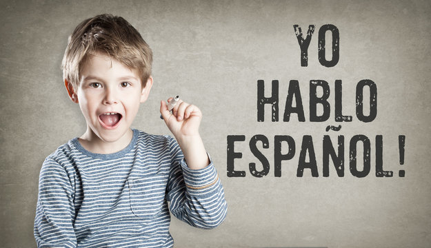 Yo hablo espanol, Spanish, Boy on grunge background writing