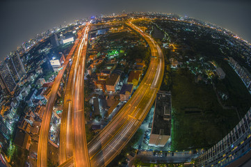 Fototapeta na wymiar Aerial view of the express way over Bangkok city scene with city light