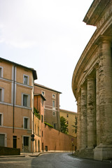 Street in Rome, Italy. The proximity of of ancient and modern architecture.