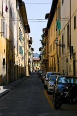 Perspective on a secluded street in Florence, Italy. The moment when life in the city if stopped.