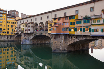 Fototapeta na wymiar Ponte Vecchio bridge and Arno river in Florence, Italy.