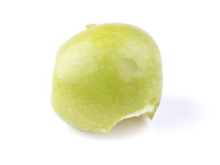 bitten green apple on a white background