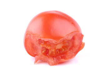 bitten red tomato on a white background © enskanto