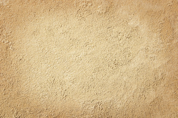 Top view of sandy beach. Background with copy space and visible sand texture. - obrazy, fototapety, plakaty