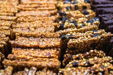Raw healthy dessert handmade from dates and nuts - gozinaki