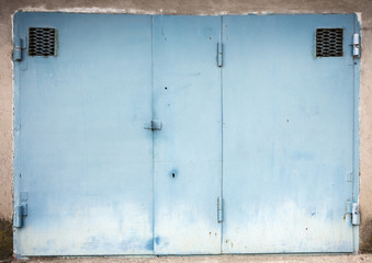 Obraz na płótnie Canvas old metal warehouse door, hangar, high resolution photo 