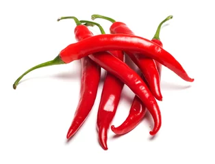 Fotobehang red hot chilli peppers isolated on white background © Alexstar