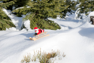 Santa Claus is driving down the mountain