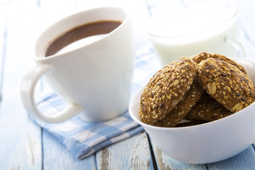 cocoa milk oatmeal cookies breakfast kitchen blue wooden background