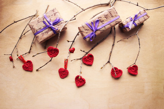 Branch with red hearts.  Showing love through handmade gift