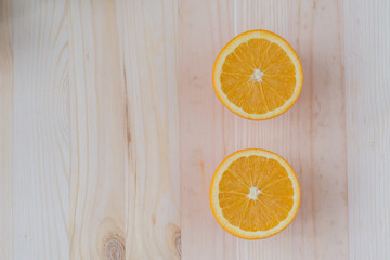 Fresh orange on wooden decks.