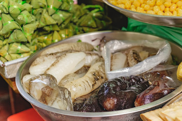 Fresh sea cucumber for sale at local street market in Thailand