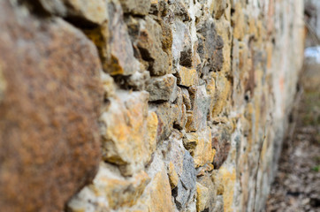 Stone wall background. Selective focus