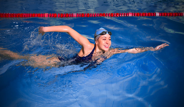 Young woman swimmer