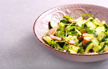 Cucumber, lettuce and chicken breast salad