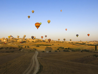 Hot air balloons at sunrise in Cappadocia