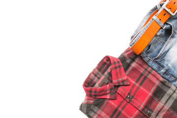 Men's casual outfits with red plaid shirt, blue jeans and brown belt on white background
