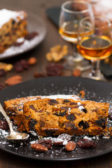 cake with dry fruits on brown plate