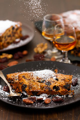 cake with dry fruits on brown plate