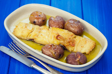 cod fish with potato on dish